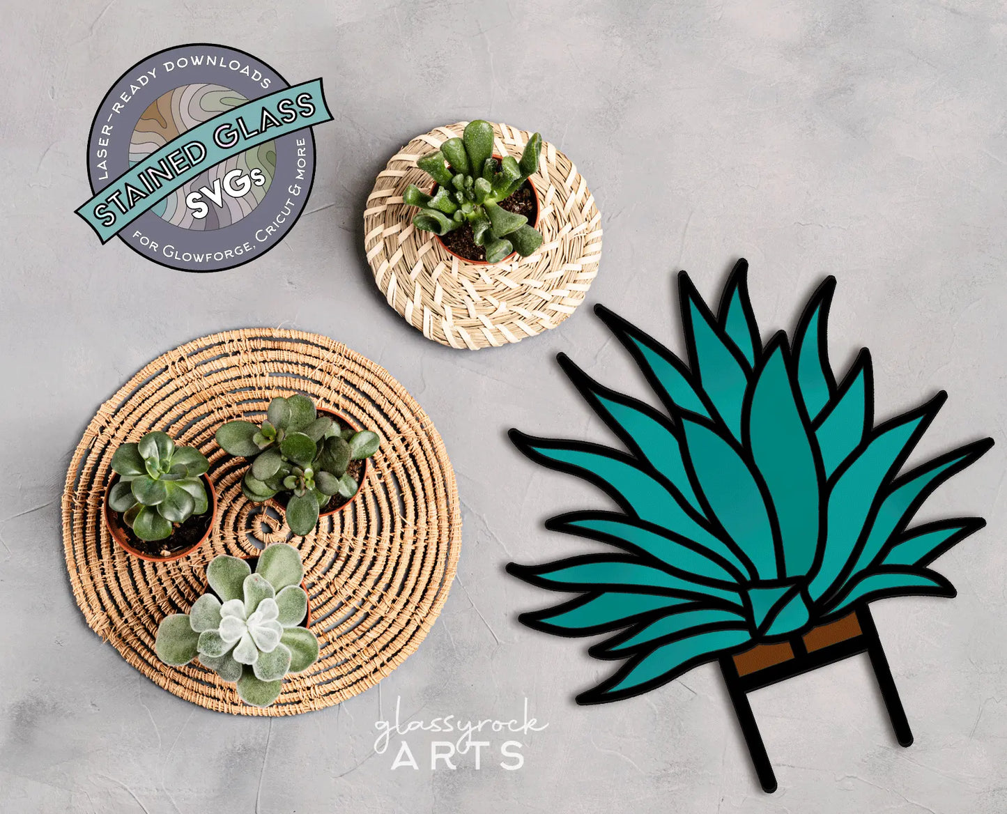 The Stained Glass Agave Plant SVG for laser cutting, ideal as a DIY gift for plant lovers, is showcased beside two woven baskets with succulents on a gray background. The image features the Stained Glass SVGs logo by Glassyrock Arts.