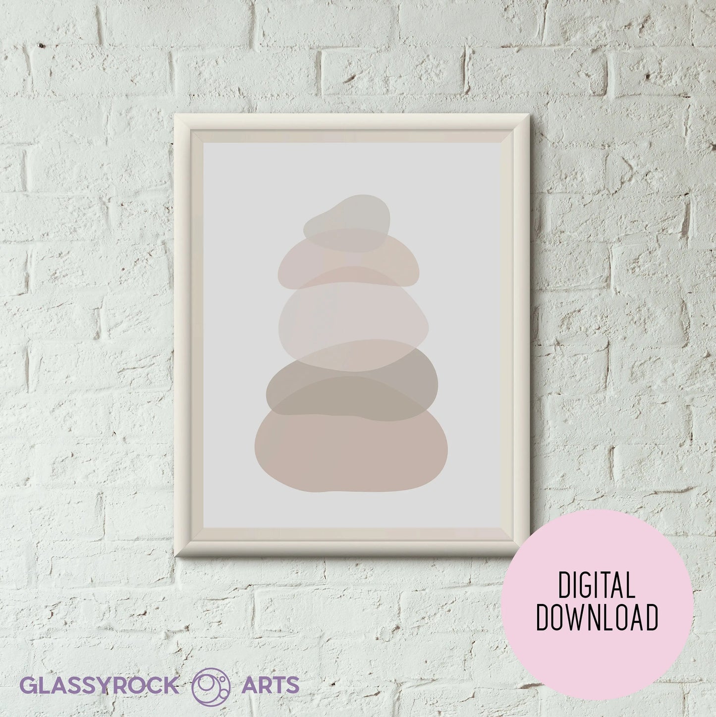 Ombre Nude Stone Shapes Digital Artwork, a framed abstract print of overlapping ovals in neutral tones, decorates a white brick wall. A pink DIGITAL DOWNLOAD circle is at the bottom right, while GLASSYROCK ARTS features on the left, emphasizing its instant digital art download.