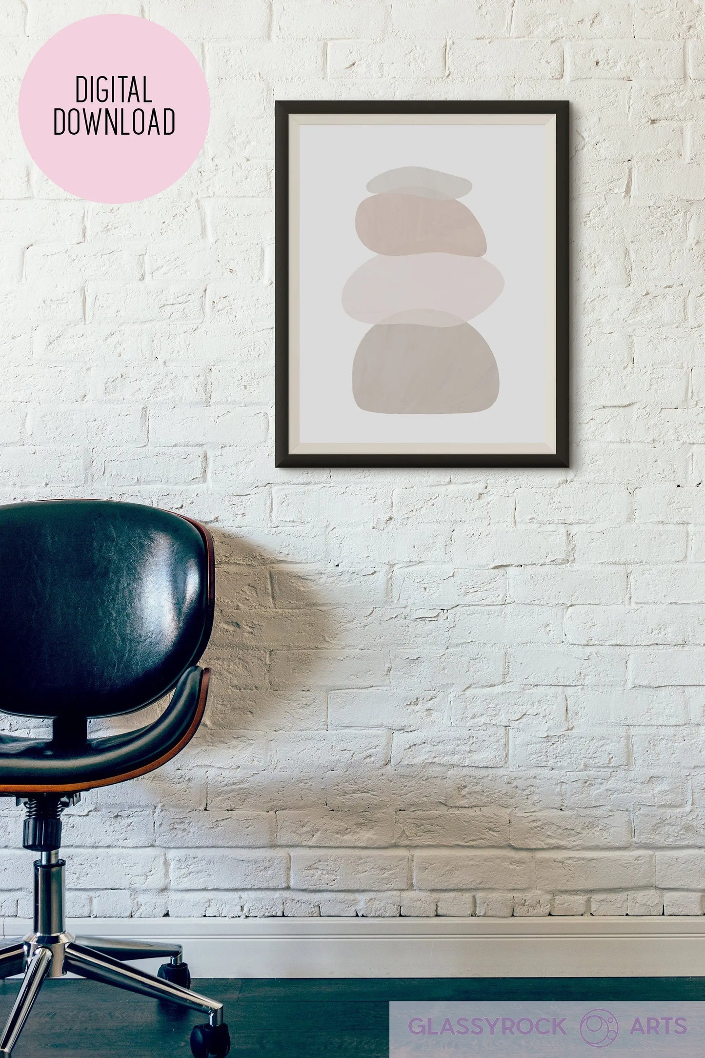 The Ombre Nude Modern Stone Shapes Digital Art hangs on a white brick wall. Nearby is a black leather chair. A pink circle in the upper left says Digital Download, and the bottom right corner features the Glassyrock Arts logo.
