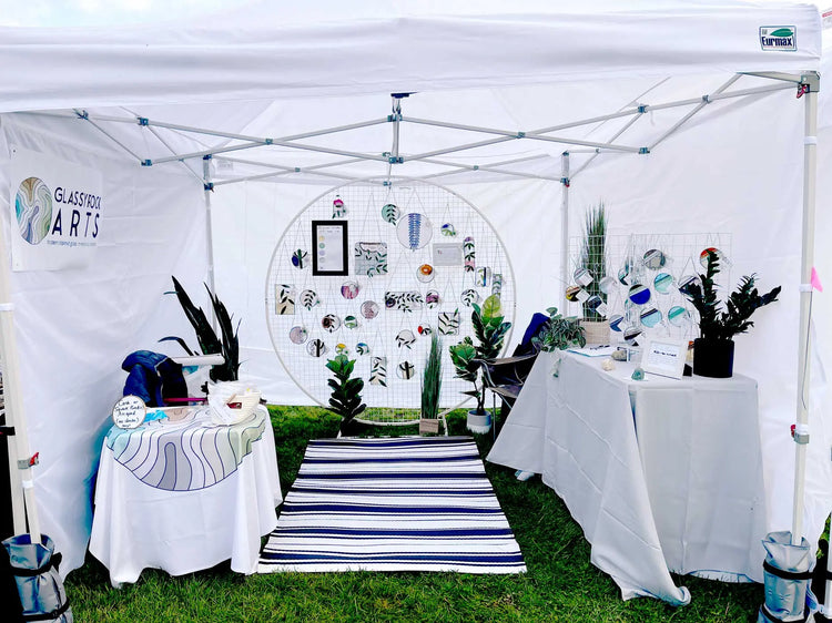 An image of the GlassyRock Arts booth at a recent fair.