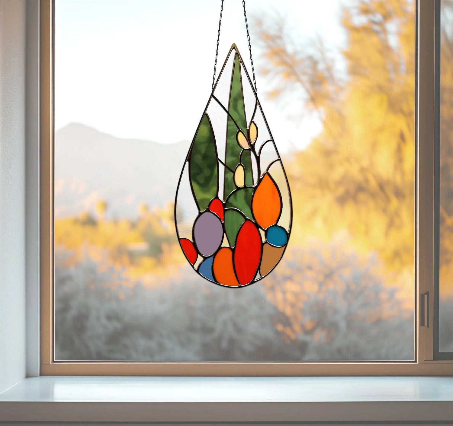 An image of the stained glass teardrop cactus suncatcher, pattern from GlassyRock Arts.