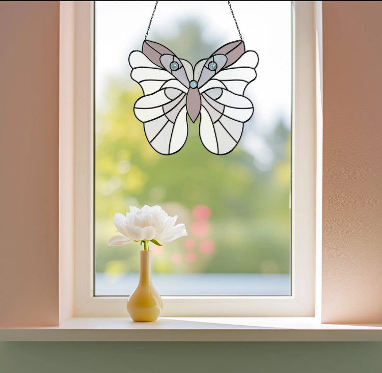 An image of the stained glass moth suncatcher, pattern from GlassyRock Arts.