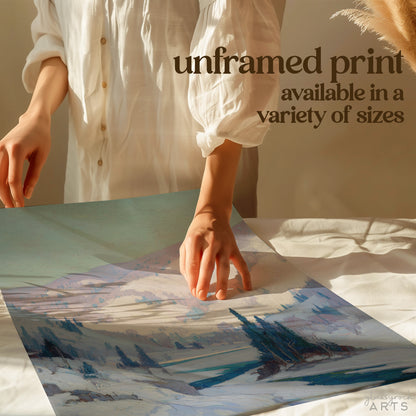 Person holding a piece of paper with a watercolor landscape, text overlay about unframed prints.