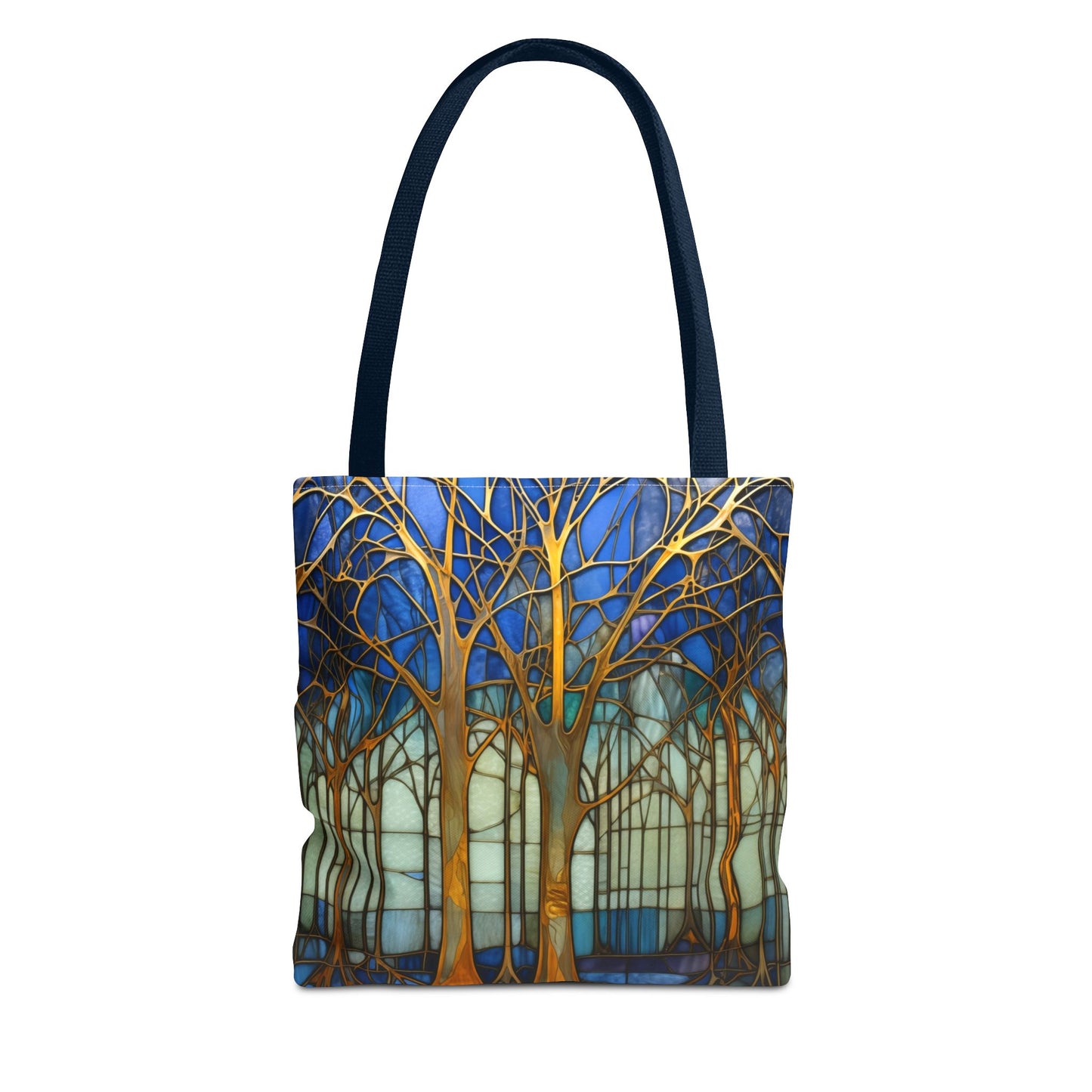 Stained Glass Blue Forest Tote Bag with navy straps features a vibrant forest design with gold trees against a blue and white background. This stylish and sturdy tote bag is perfect for your daily errands and comes in three different sizes.