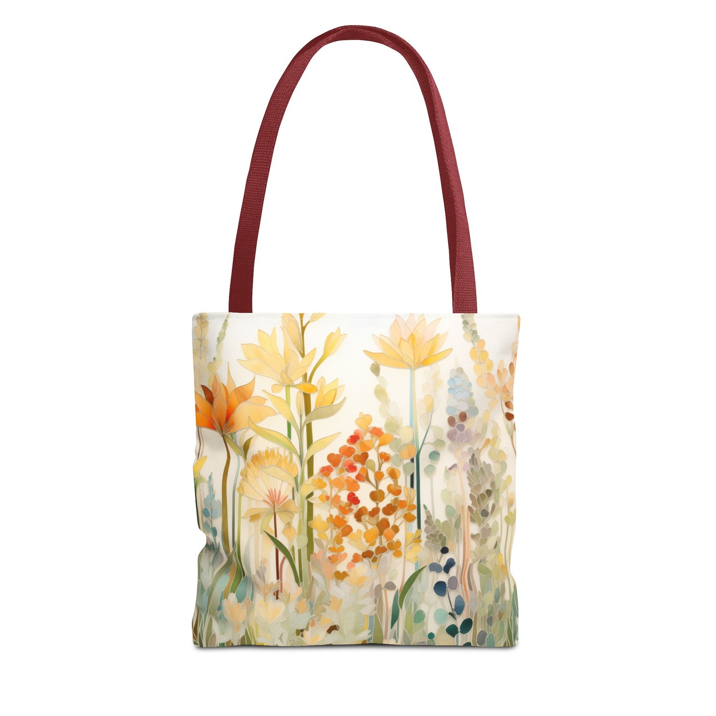 The Stained Glass Fall Flowers Tote Bag, available in three sizes, features an original artist design with floral motifs in yellow, orange, and pale blue on a soft light background. Made from durable polyester with maroon straps.