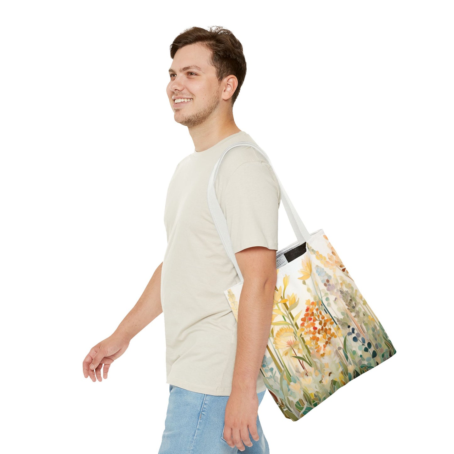 A person with short brown hair, wearing a light-colored shirt, carries a Stained Glass Fall Flowers Tote Bag. They are smiling and walking against a plain white background.