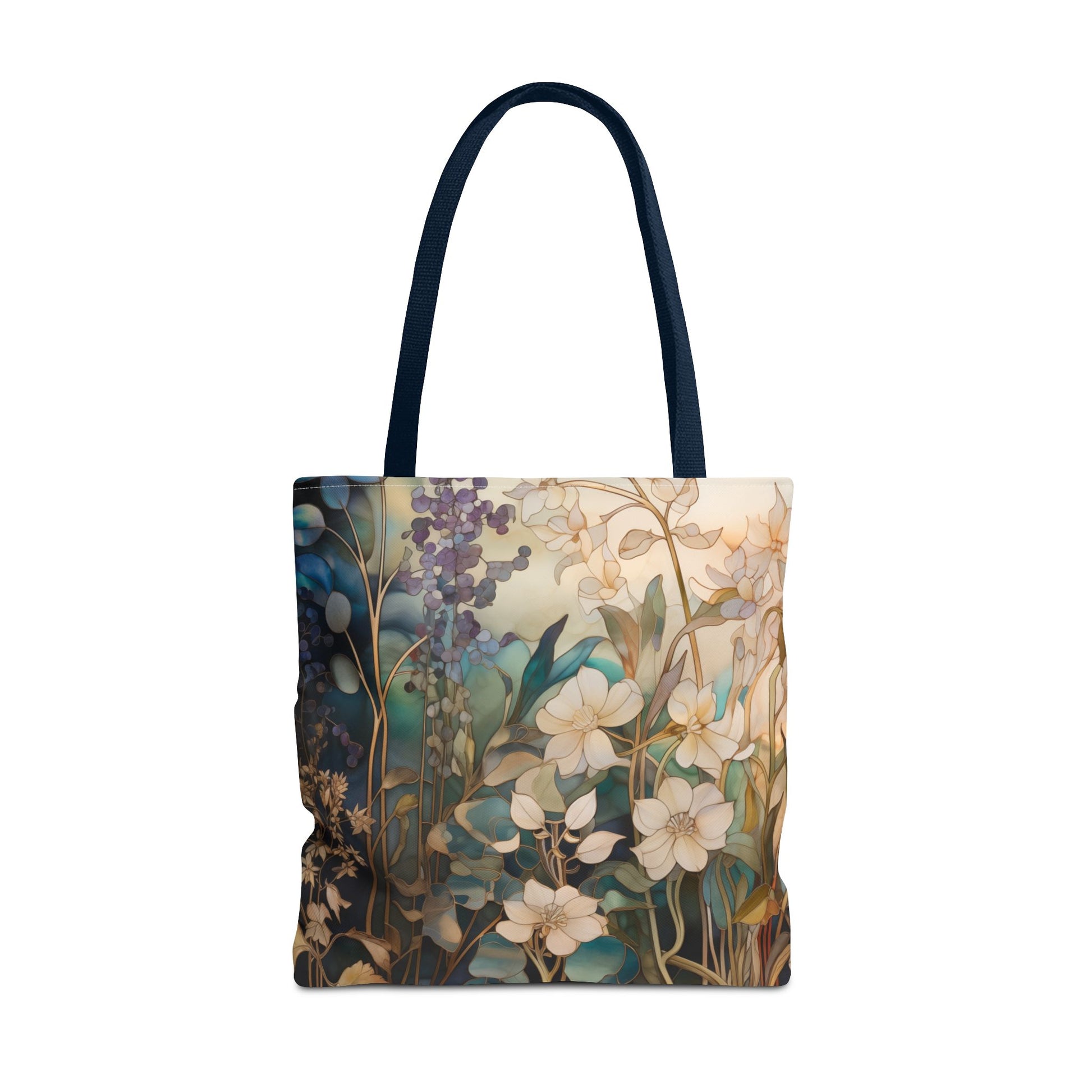 The Stained Glass Midnight Flowers Tote Bag, available in three sizes, is a durable polyester bag with black handles that boasts an artistic floral design reminiscent of stained glass, showcasing various flowers and plants in shades of blue, green, and white.