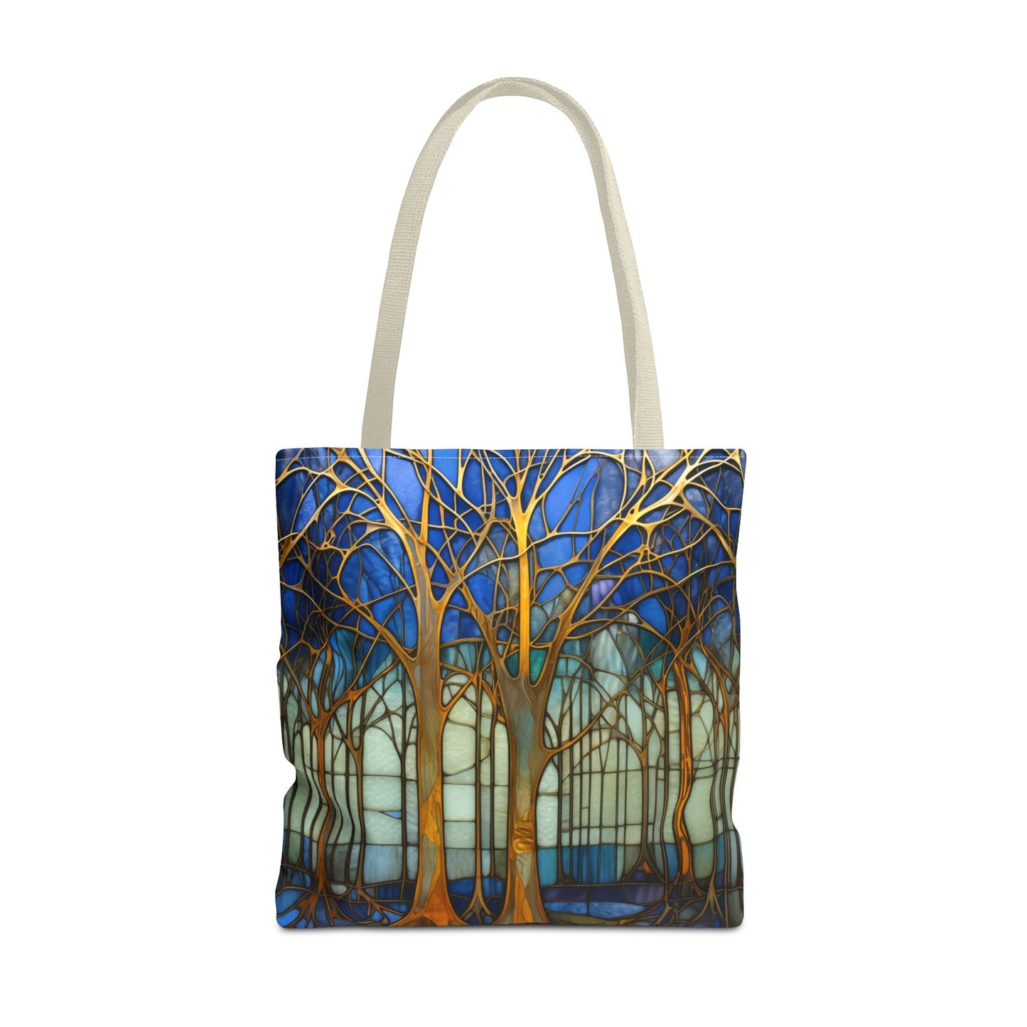 Stained Glass Blue Forest Tote Bag with beige straps features a vibrant forest design with gold trees against a blue and white background. This stylish and sturdy tote bag is perfect for your daily errands and comes in three different sizes.