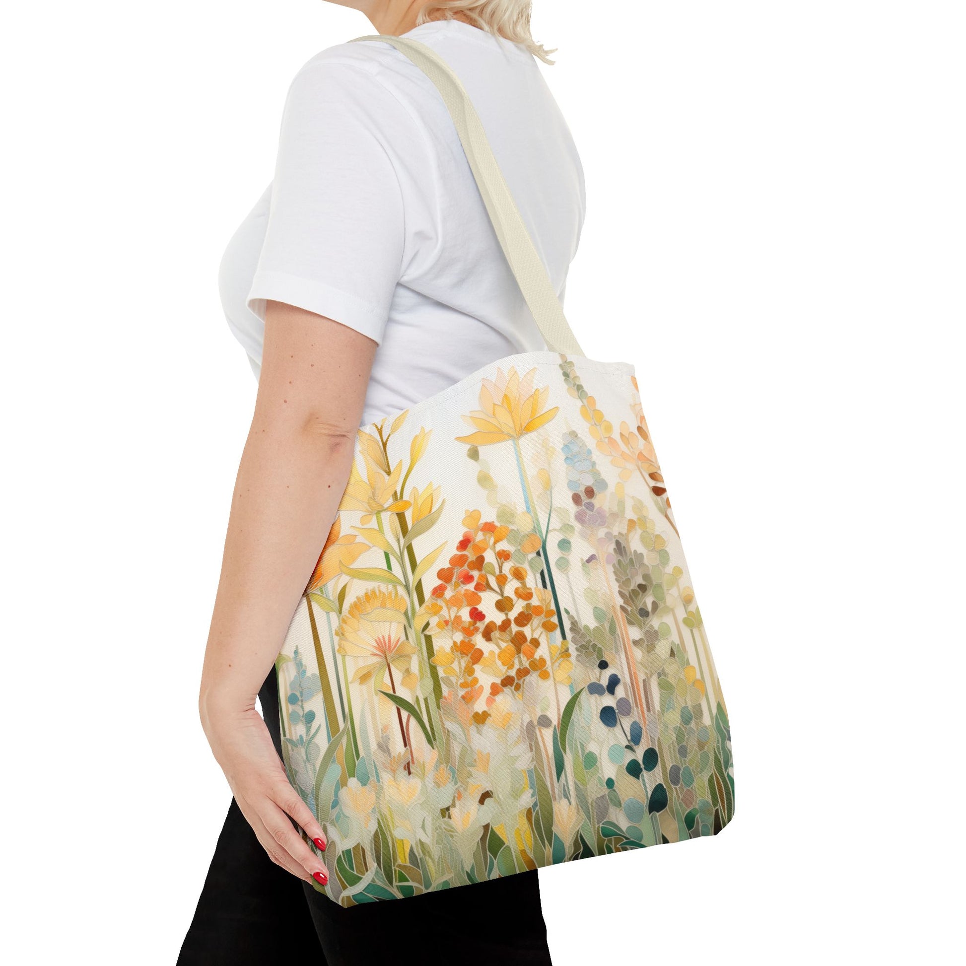 Person carrying the Stained Glass Fall Flowers Tote Bag, featuring a colorful floral design crafted from durable polyester materials, dressed in a white t-shirt.