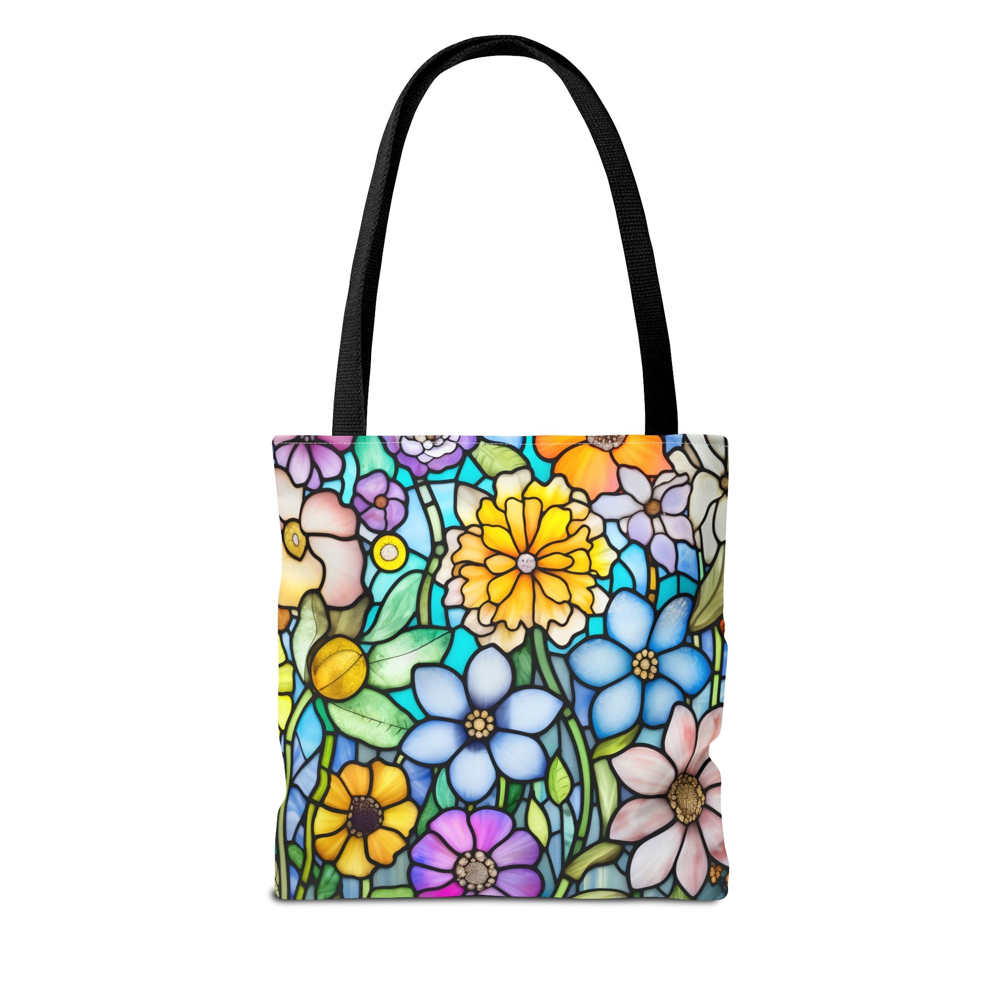 The Stained Glass Folk Art Flowers Tote Bag exhibits a vibrant floral pattern in blue, yellow, purple, orange, and green. Made from durable polyester with sleek black handles for easy carrying, its available in 3 sizes.