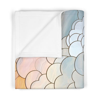 A picture of the Stained Glass Clouds Boho Baby Blanket, Calming Clouds Print from GlassyRock Arts. 