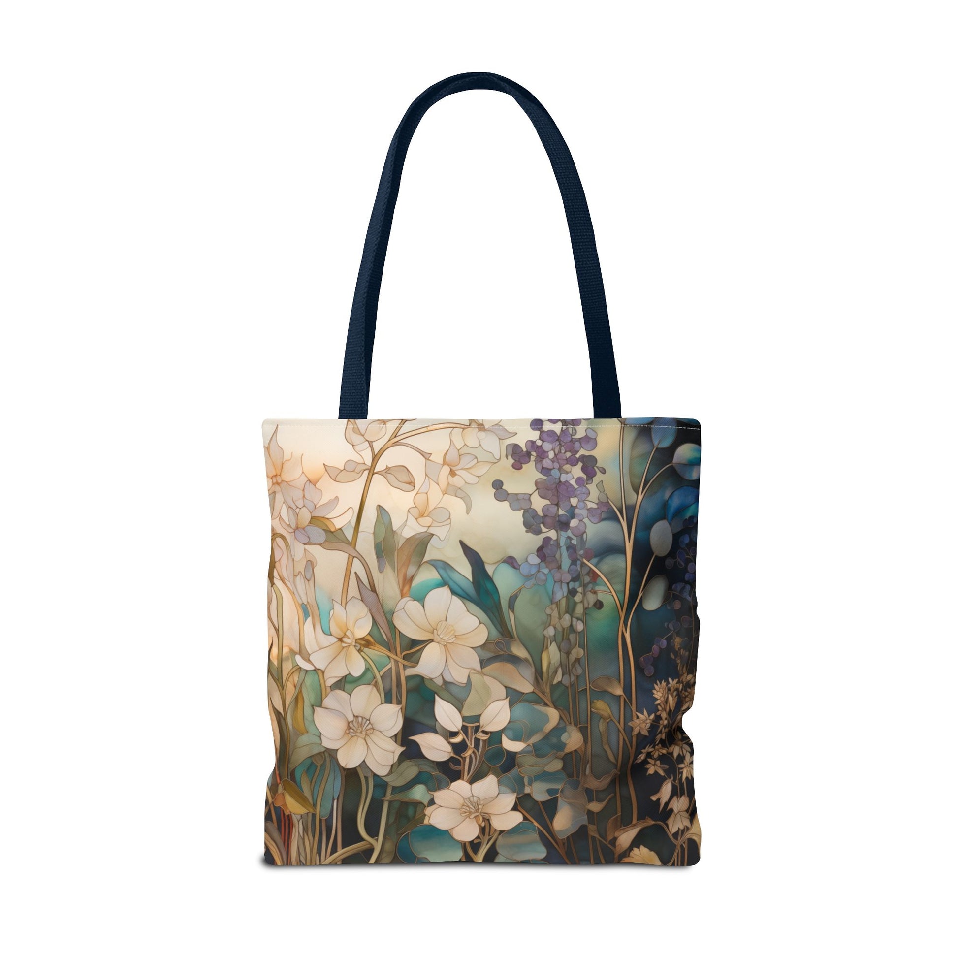 Introducing the Stained Glass Midnight Flowers Tote Bag, available in three sizes and crafted from durable polyester with dark handles. It boasts an intricate floral design in shades of green, blue, and cream, reminiscent of stained glass.