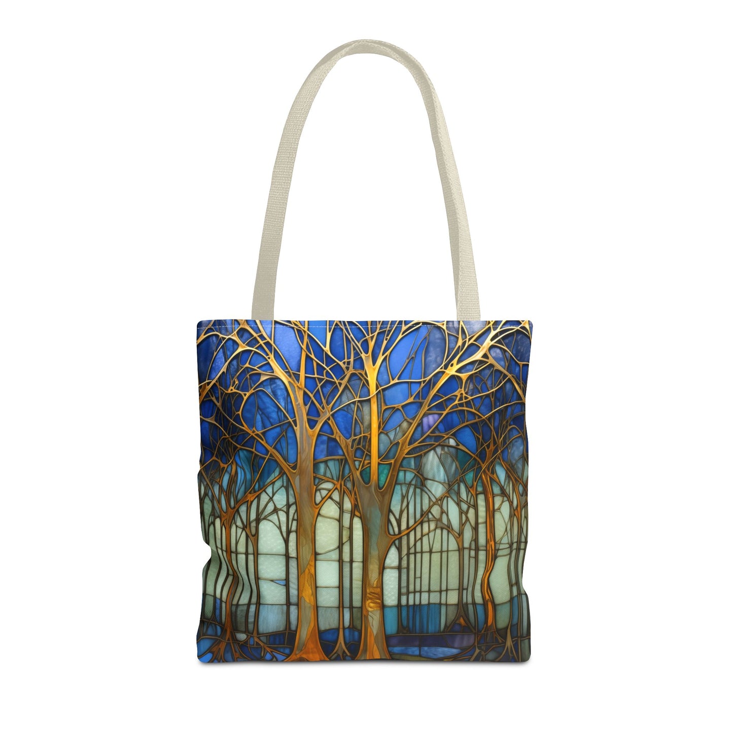 Stained Glass Blue Forest Tote Bag with beige straps features a vibrant forest design with gold trees against a blue and white background. This stylish and sturdy tote bag is perfect for your daily errands and comes in three different sizes.