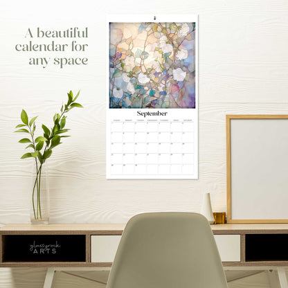 The birth flowers calendar hanging on a white wall over a desk. The text reads "a beautiful calendar for any space."