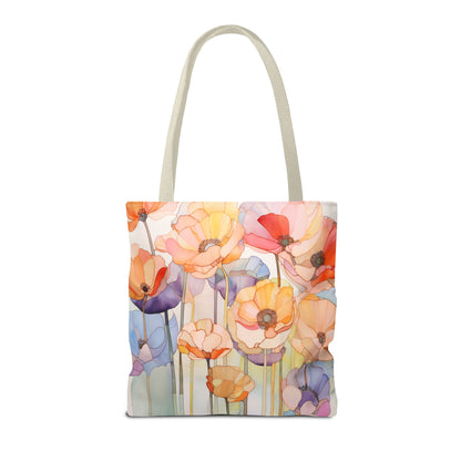 The Stained Glass Poppy Flowers Tote Bag, available in three sizes, features a vibrant stained glass design showcasing multicolored flowers on a light background. Made of durable polyester, this tote bag comes with two white handles.