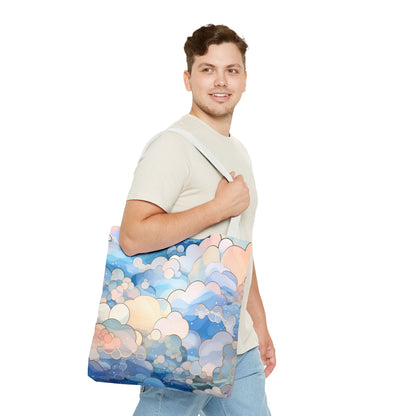 A person wearing a light gray shirt and jeans carries the Stained Glass Clouds Tote Bag, featuring a colorful cloud pattern in blue, pink, and cream. They smile and gaze sideways against a plain white background.