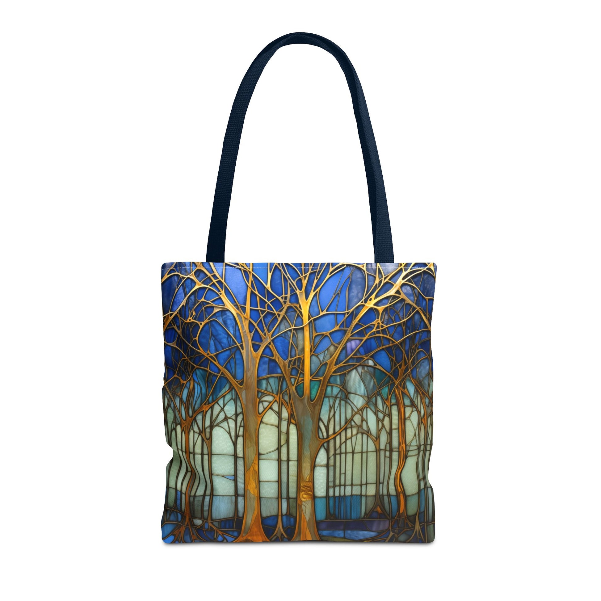 Stained Glass Blue Forest Tote Bag with black straps features a vibrant forest design with gold trees against a blue and white background. Crafted from durable polyester, this stylish and sturdy tote bag is perfect for your daily errands and comes in three different sizes.