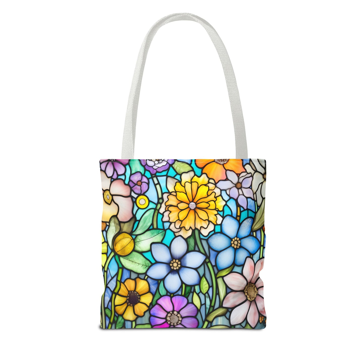 The Stained Glass Folk Art Flowers Tote Bag is crafted from durable polyester and features an original artist design with blue, yellow, pink, and orange floral patterns. The vibrant design is complemented by white straps and comes in 3 sizes.