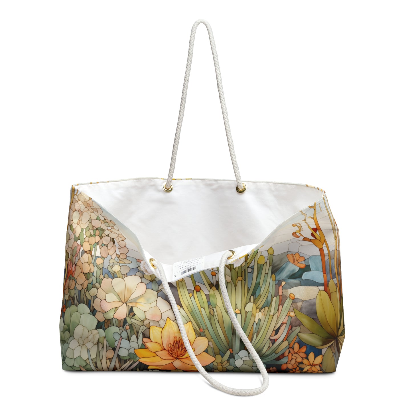 The Stained Glass Desert Cactus Oversized Tote Bag features a floral design with green, yellow, and orange succulents and flowers. It has white rope handles, a spacious opening, and is crafted from sturdy yet lightweight material.