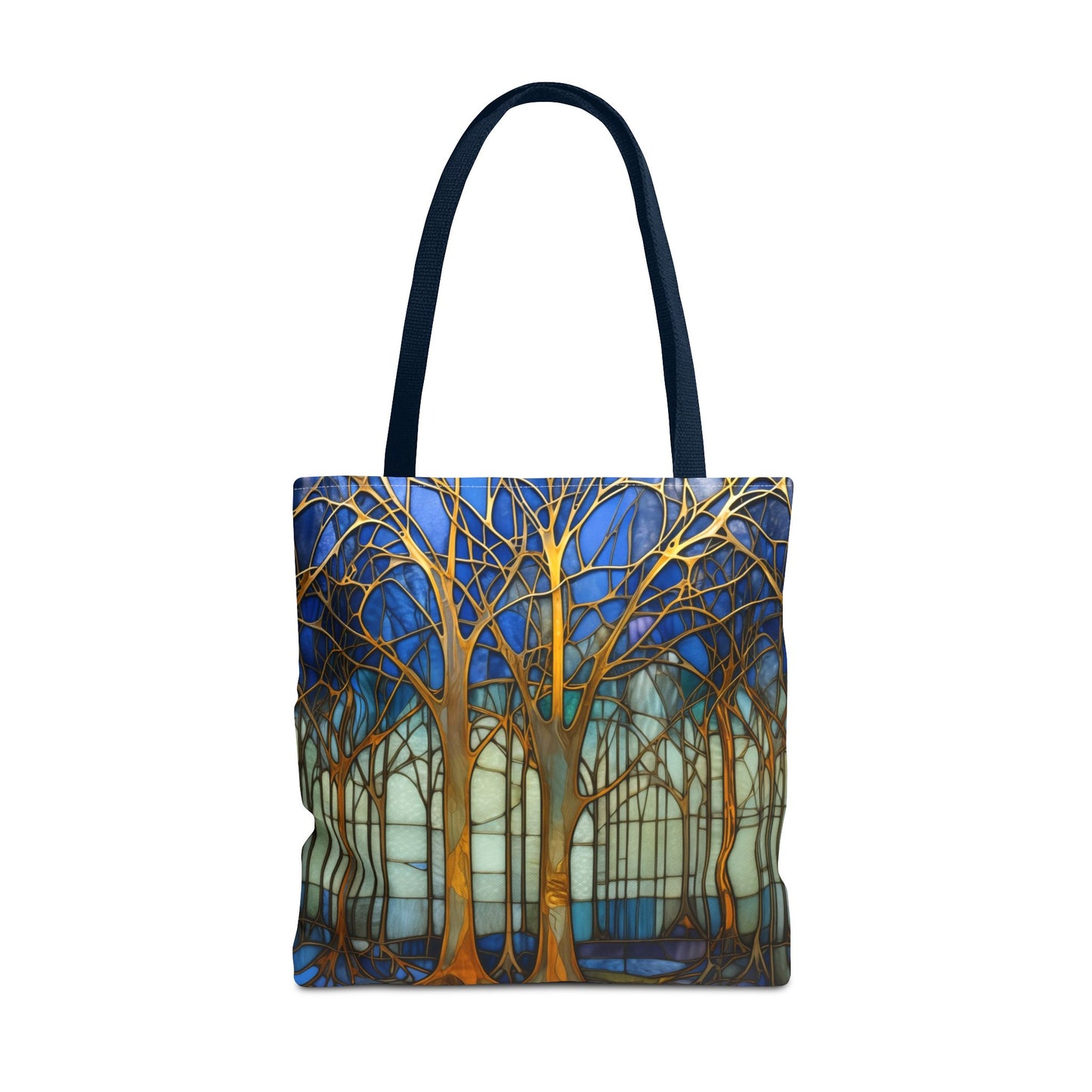 Stained Glass Blue Forest Tote Bag with navy straps features a vibrant forest design with gold trees against a blue and white background. This stylish and sturdy tote bag is perfect for your daily errands and comes in three different sizes.