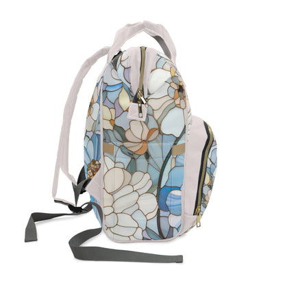 A picture of the Stained Glass Flowers Multi-Purpose Diaper Backpack from GlassyRock Arts. 