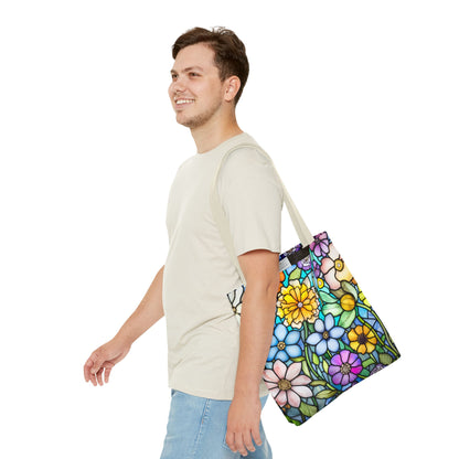 A smiling person in a light gray t-shirt and blue jeans carries the "Stained Glass Folk Art Flowers Tote Bag" made from durable polyester materials over their shoulder while walking.