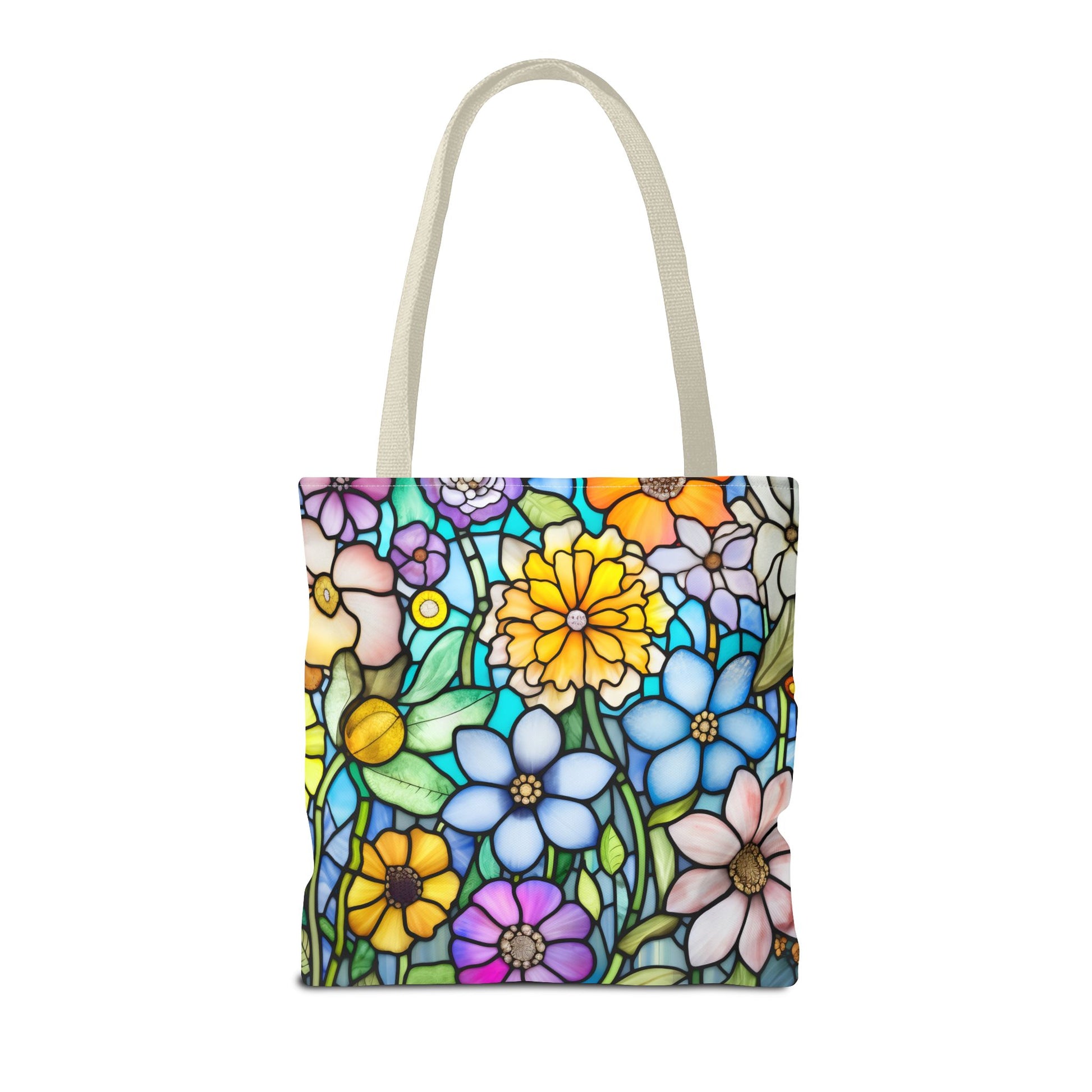 The Stained Glass Folk Art Flowers Tote Bag, available in three different sizes, showcases a vibrant floral pattern with an array of multicolored flowers and green leaves, crafted from durable polyester materials.