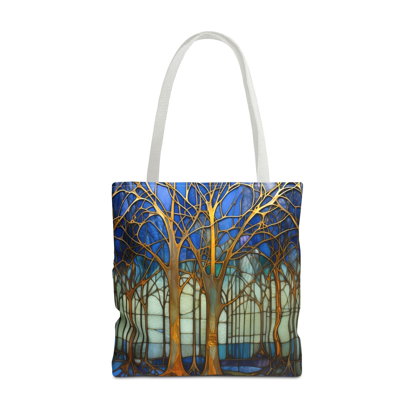 Stained Glass Blue Forest Tote Bag with white straps features a vibrant forest design with gold trees against a blue and white background. This stylish and sturdy tote bag is perfect for your daily errands and comes in three different sizes.