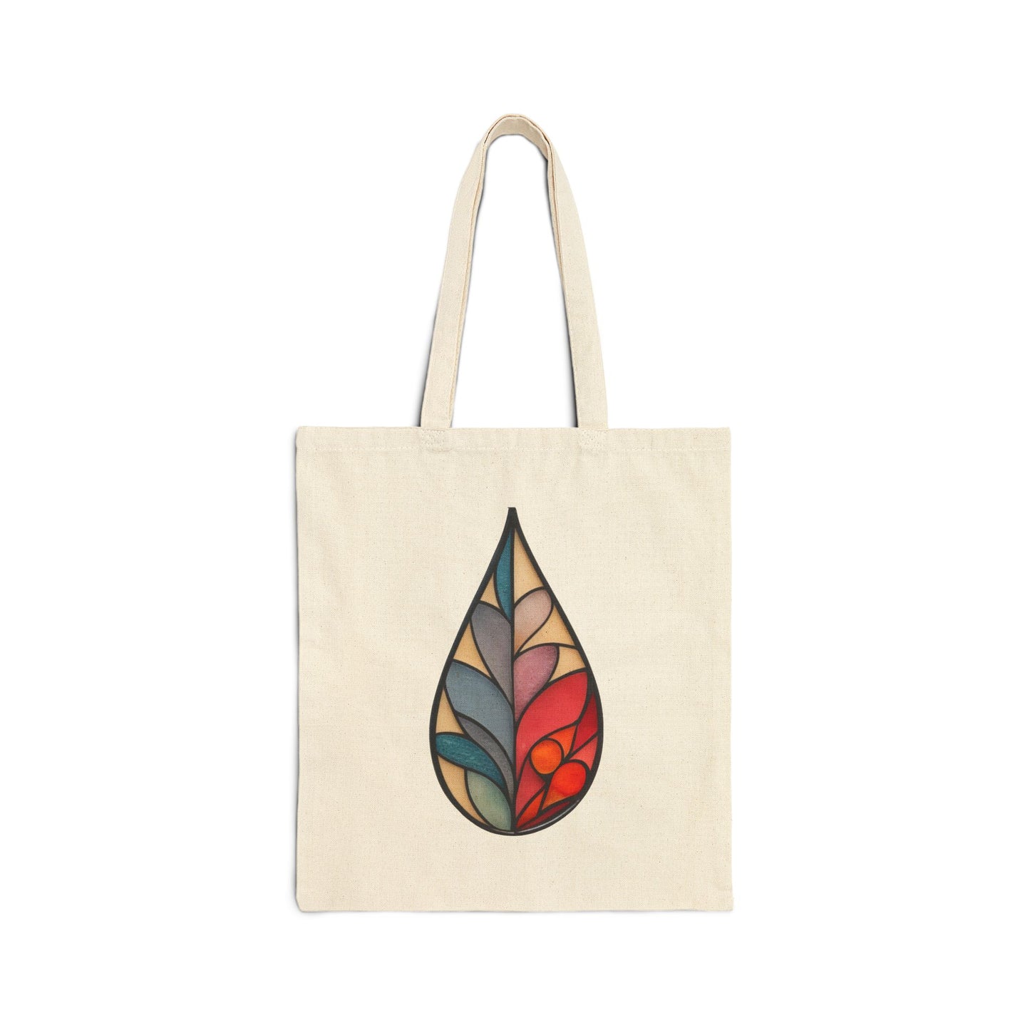 The Stained Glass Raindrop Cotton Canvas Tote Bag showcases a teardrop design with abstract stained glass patterns in vibrant blues, oranges, and greens, forming an eye-catching original artwork on its beige surface.