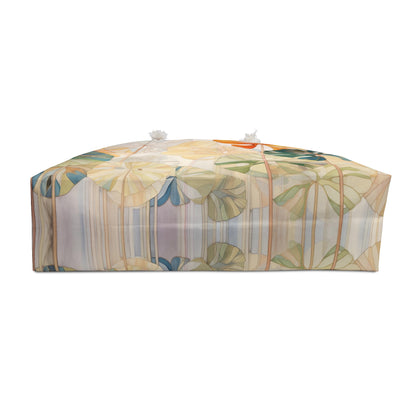 A gift wrapped in vibrant paper with a stained glass monstera design, featuring vertical lines in green, orange, blue, and yellow on a white background. Two small bows embellish the top.