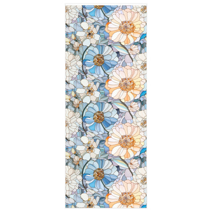 The Stained Glass Flowers Wrapping Paper features large, stylized daisies in blue, peach, and white on a light background. The intricate stained glass floral design creates a vibrant effect, making it ideal for premium gloss paper or gift wrap.