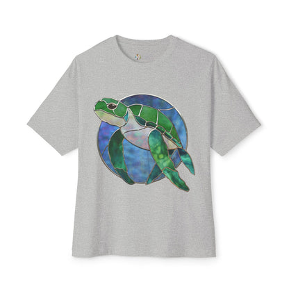 Stained Glass Turtle Oversized Tee Shirt by Bella+Canvas featuring a Noelle Barnes design of a green and blue stained glass sea turtle on the front.