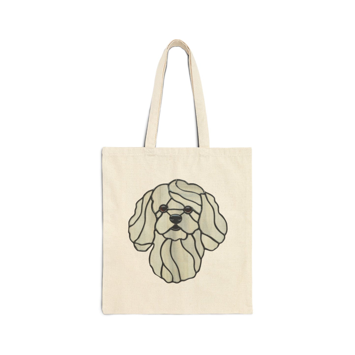 The Stained Glass Bichon Frise Cotton Canvas Tote Bag features a stylized image of a long-haired dog in black outlines on the front. Crafted from durable cotton canvas, the beige tote bag has two handles for carrying.