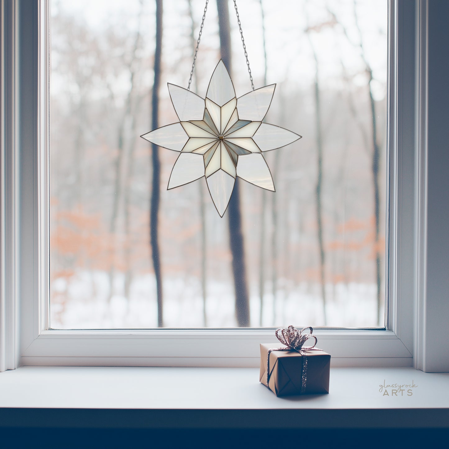 A picture of an art deco geometric snowflake stained glass pattern from GlassyRock Arts.