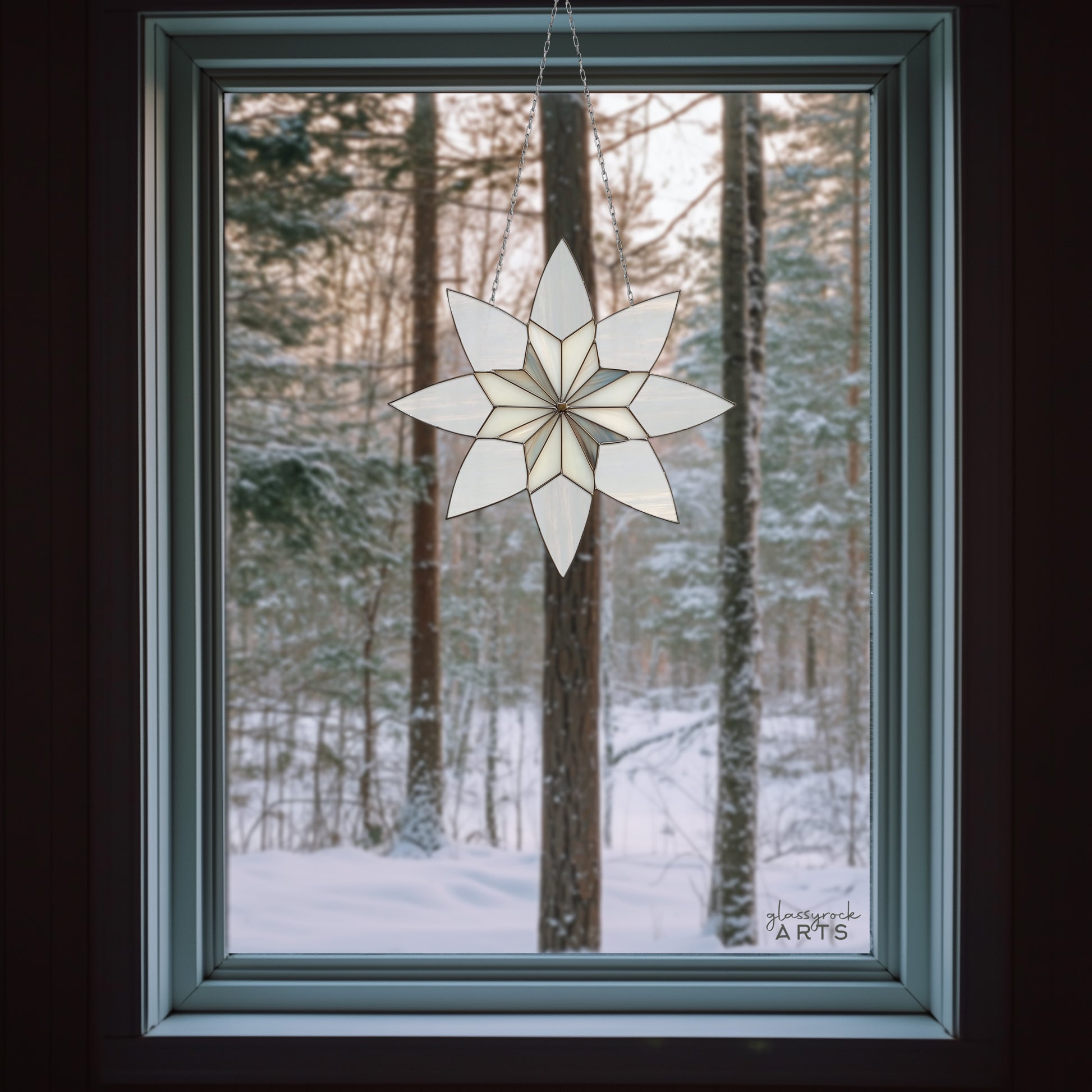 A picture of an art deco geometric snowflake stained glass pattern from GlassyRock Arts.