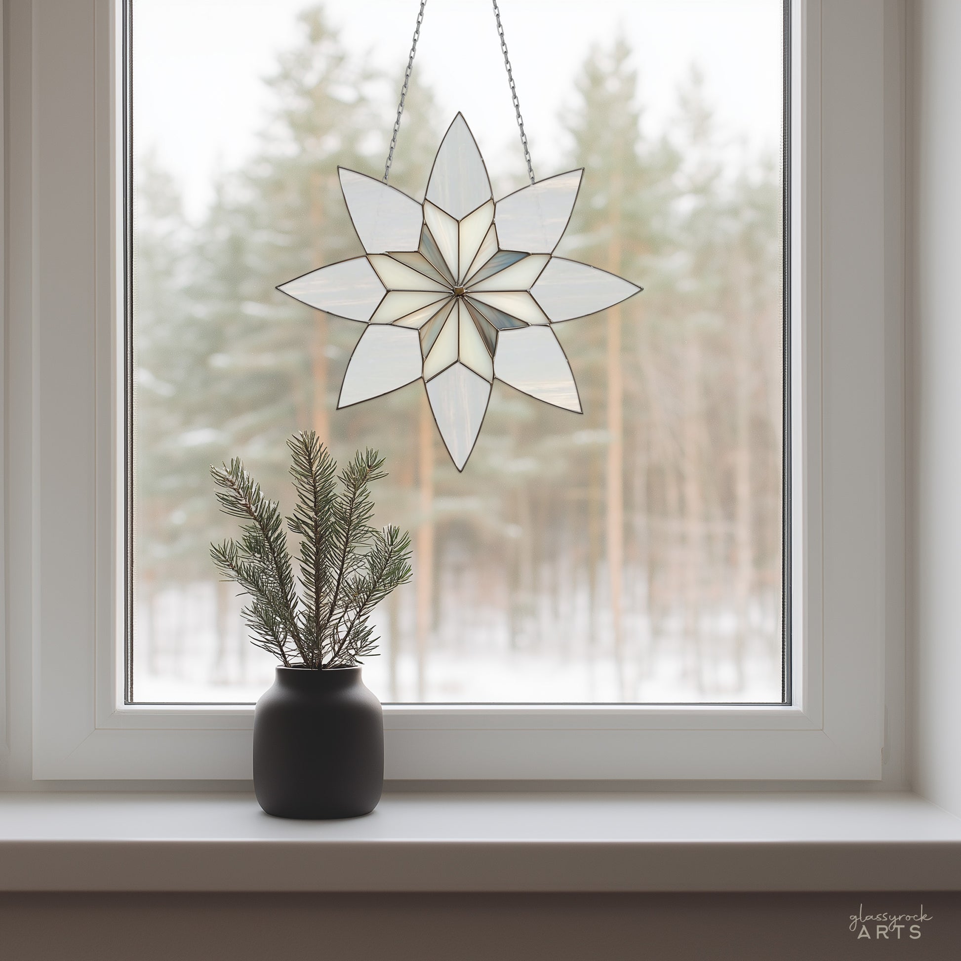 A picture of an art deco geometric snowflake stained glass pattern from GlassyRock Arts.