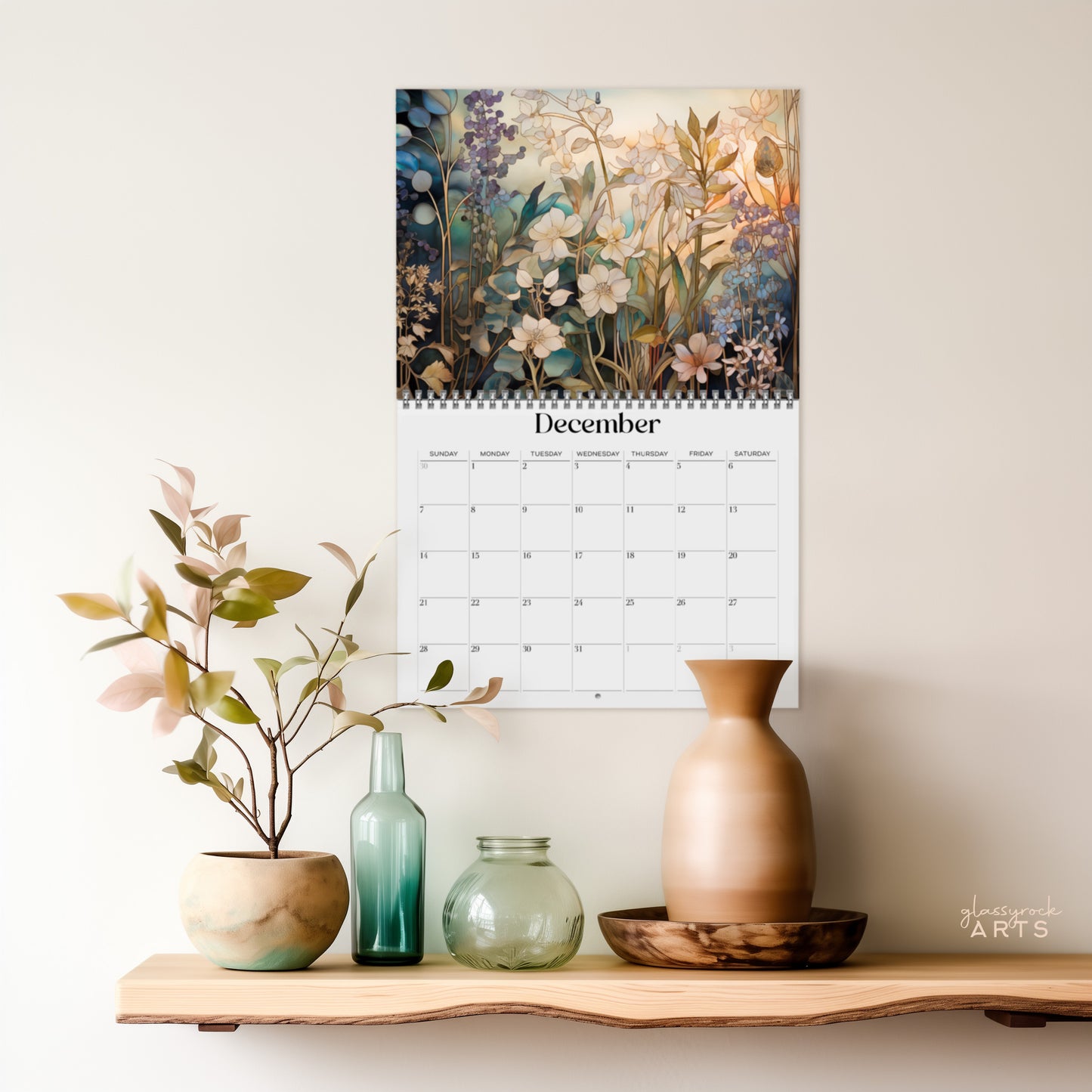 The 2025 Wall Calendar - Stained Glass Tropical Blooms, features vivid tropical flower illustrations. 