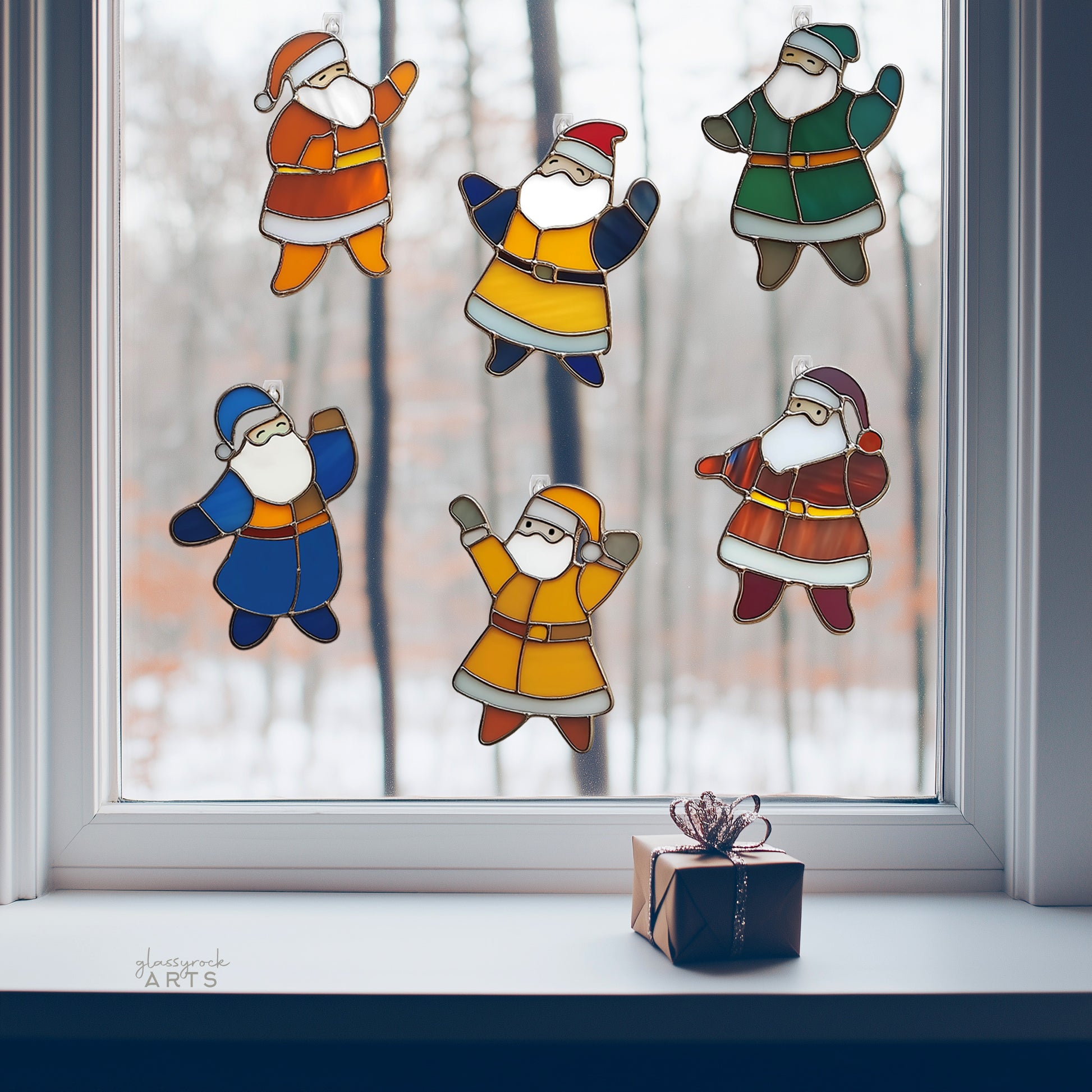 A picture of the Dancing Santas Stained Glass Christmas Ornament Patterns from GlassyRock Arts. 