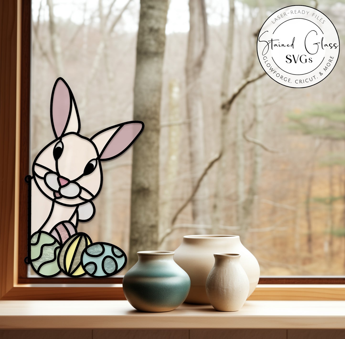 The Stained Glass Easter Bunny SVGs feature a cartoon rabbit peeking over colorful eggs in a stained glass style, set against blurred trees with three ceramic vases on the sill.