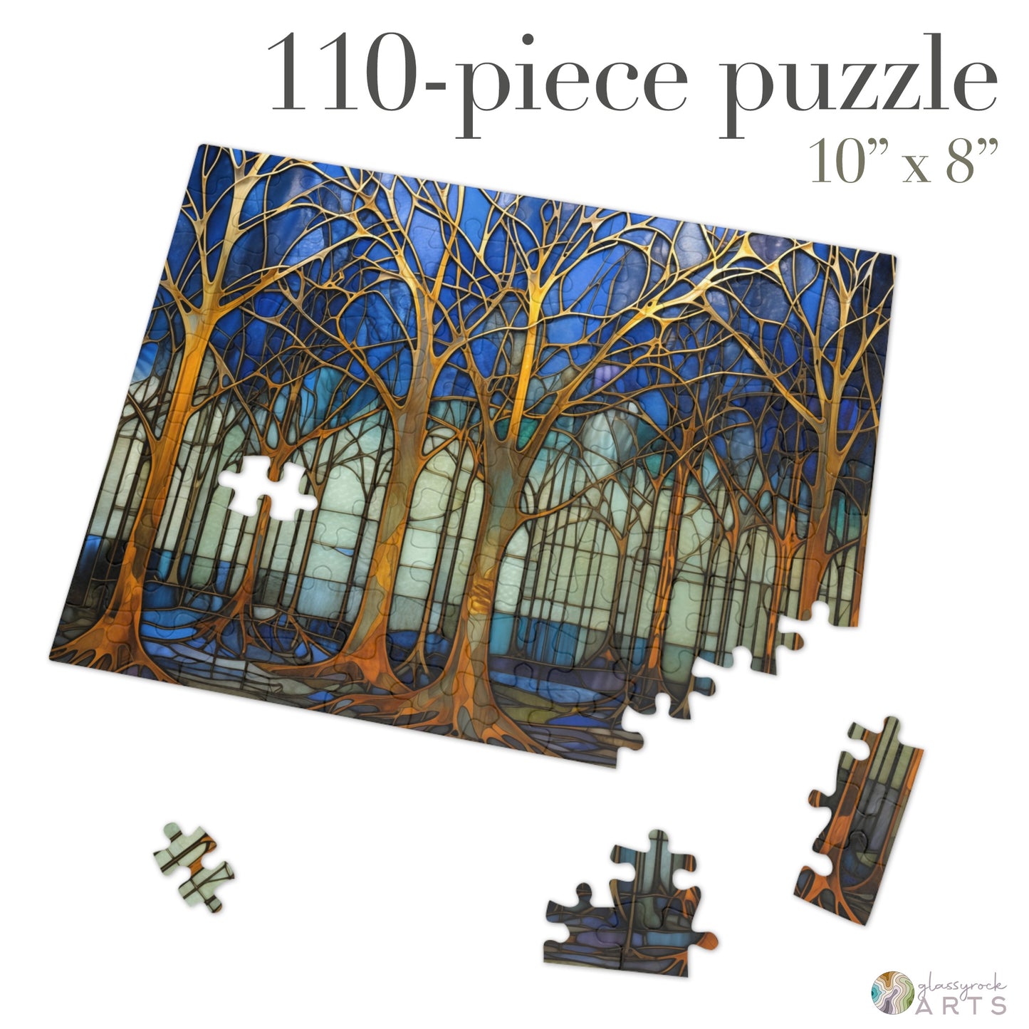 The Stained Glass Forest Jigsaw Puzzle, Blue and Gold, is a 110-piece set featuring an artistic depiction of bare trees against a blue and green background. Made from high-quality chipboard, the partially completed puzzle measures 10x8 with loose pieces nearby—perfect for any puzzle enthusiast.