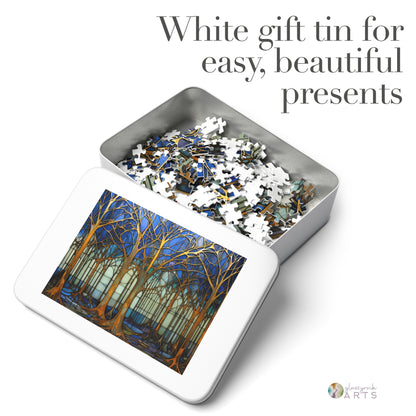 A white tin box with a blue and gold Stained Glass Forest puzzle design on the lid holds top-quality chipboard pieces. The text reads, White gift tin for easy, beautiful presents—an ideal gift for puzzle lovers.