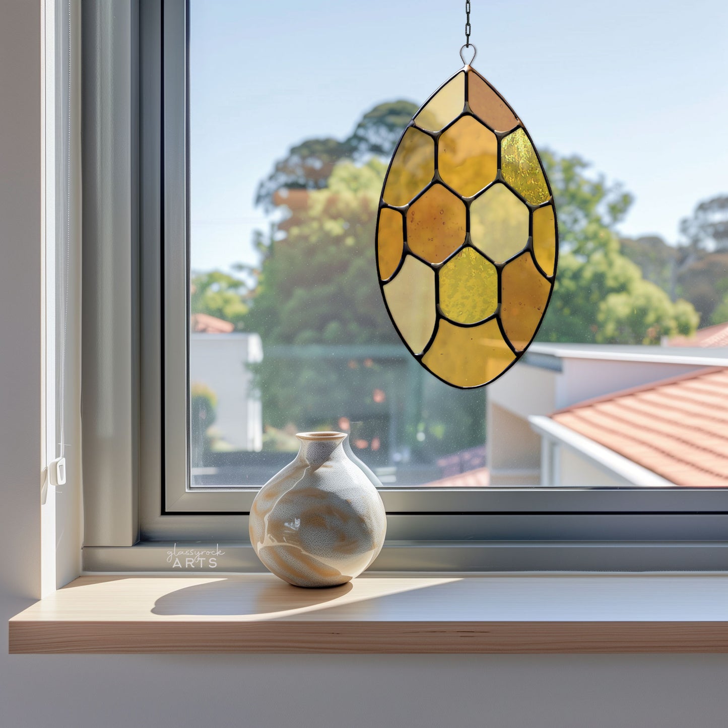 A picture of the Abstract Honeycomb Teardrop Stained Glass Pattern from GlassyRock Arts. 