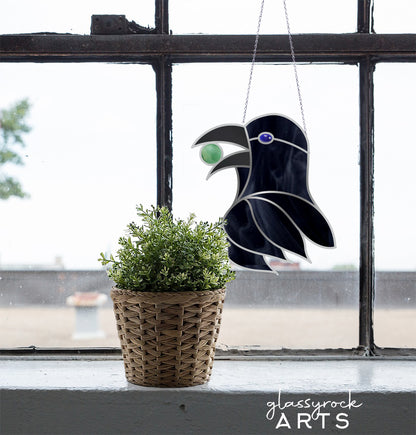 A picture of the Gemstone Crow Stained Glass Pattern from GlassyRock Arts. 