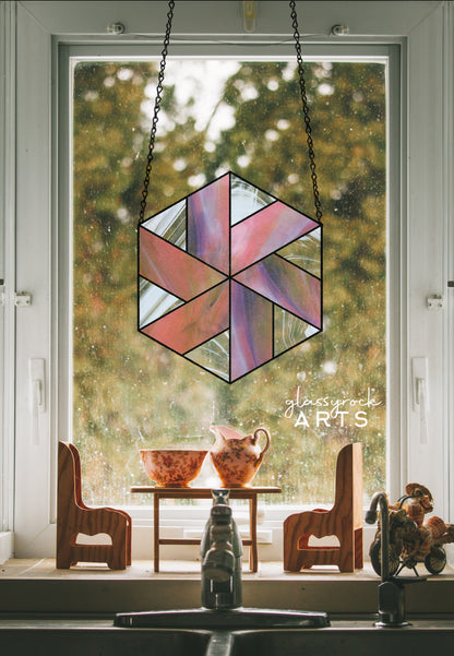 A picture of the Geometric Pinwheel Hexagon Beginner Stained Glass Pattern from GlassyRock Arts. 