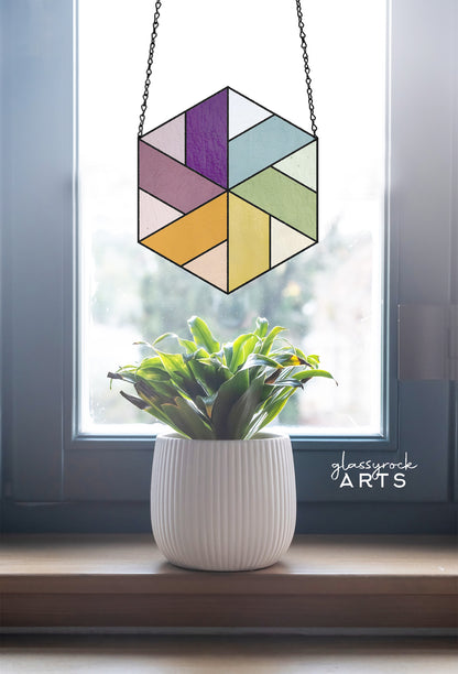 A picture of the Geometric Pinwheel Hexagon Beginner Stained Glass Pattern from GlassyRock Arts. 