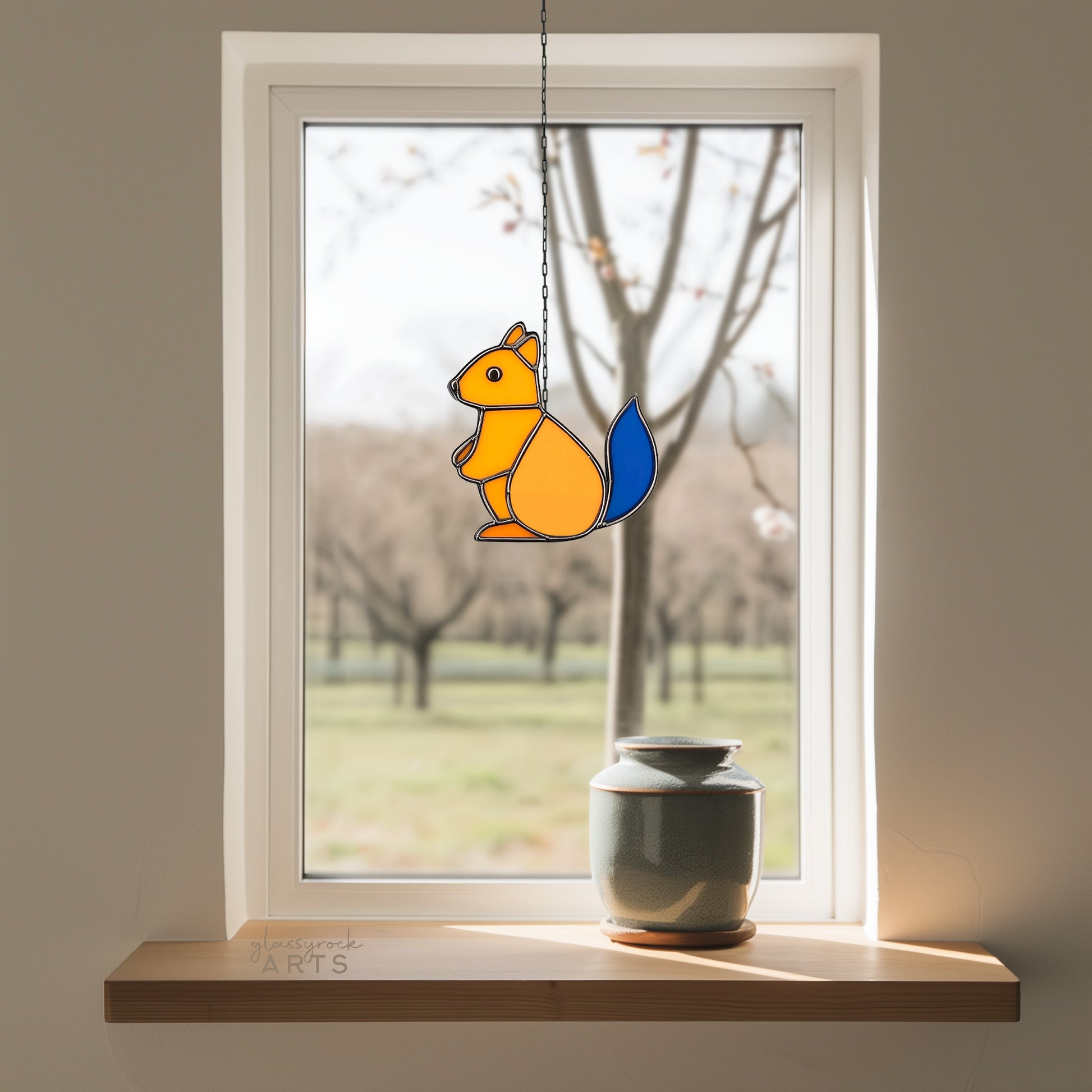 A picture of the Cute Squirrel Stained Glass Christmas Ornament Patterns from GlassyRock Arts. 