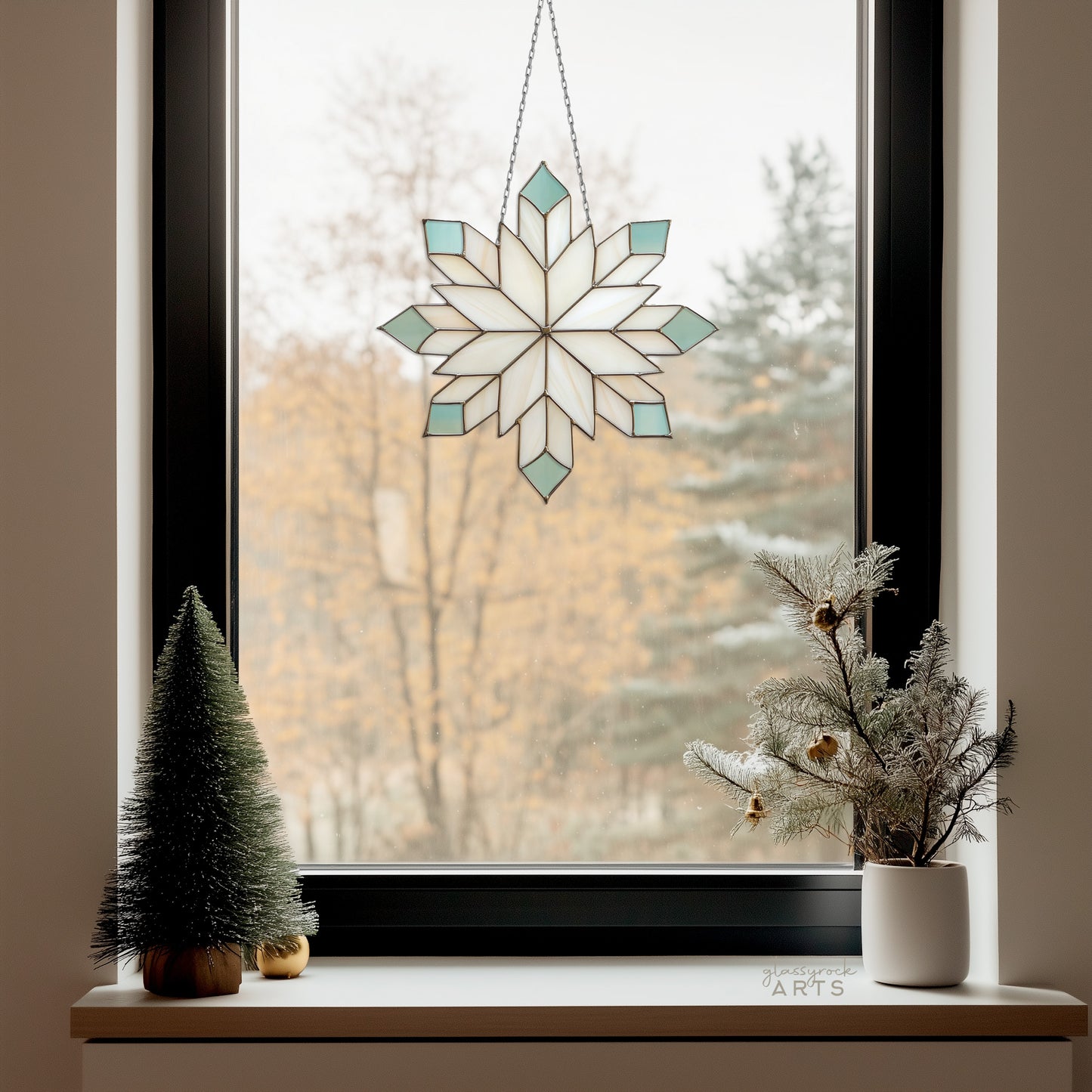 A picture of a geometric snowflake stained glass pattern from GlassyRock Arts.