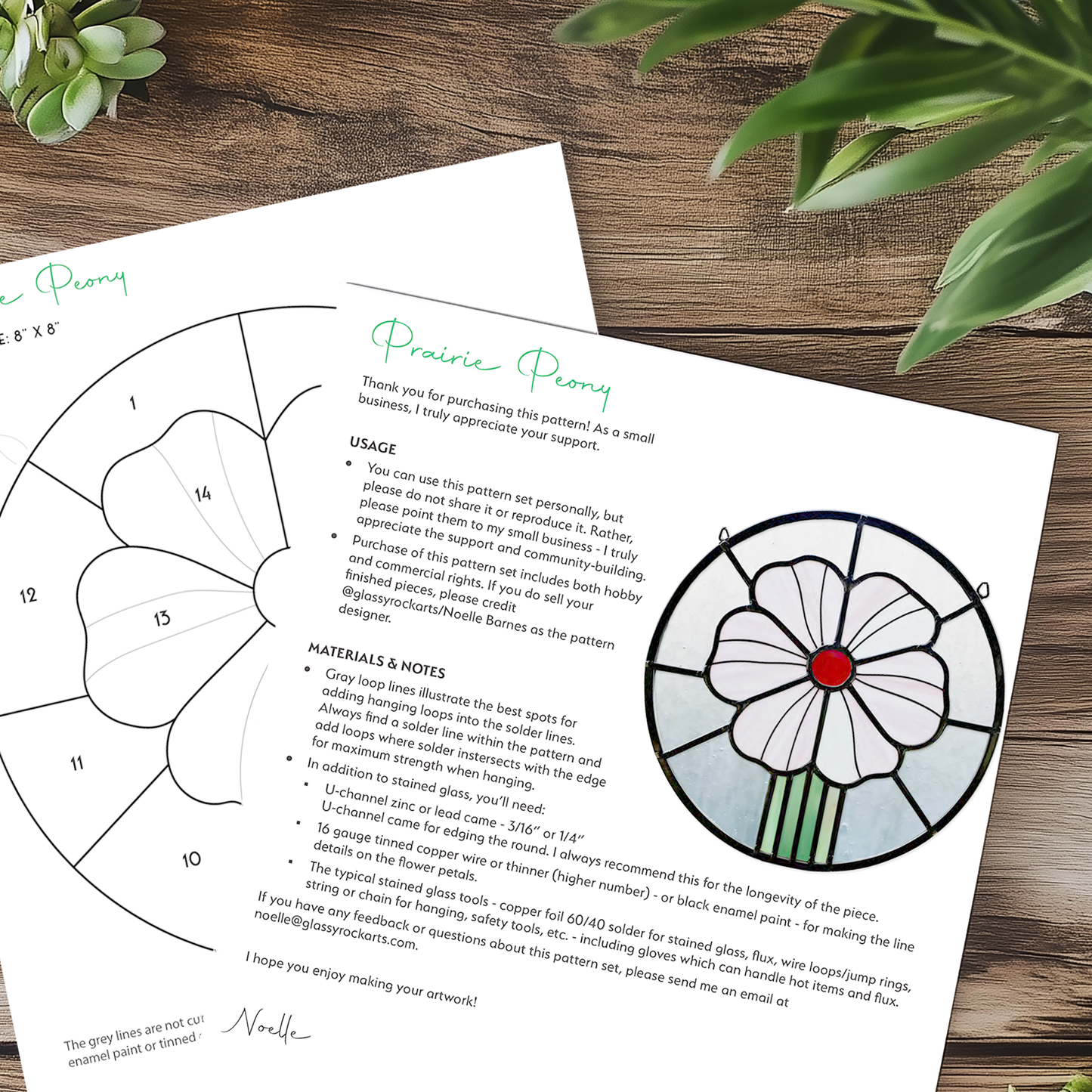 Two pages of the prairie peony pattern on a wood table with plants.