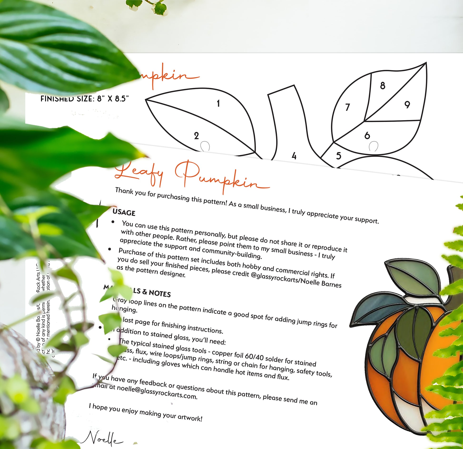 A leafy pumpkin suncatcher pattern, two pages on a table with plants.