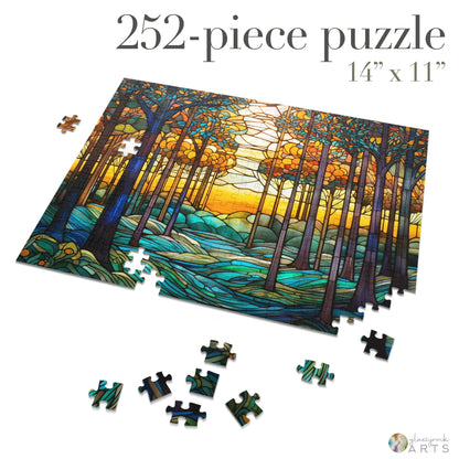 The Stained Glass Rainbow Forest Jigsaw Puzzle is a 252-piece set that showcases a vibrant landscape with tall trees and a river, resembling stained glass art. Its high-quality chipboard pieces are scattered around. Text reads, 252-piece puzzle, 14 x 11.